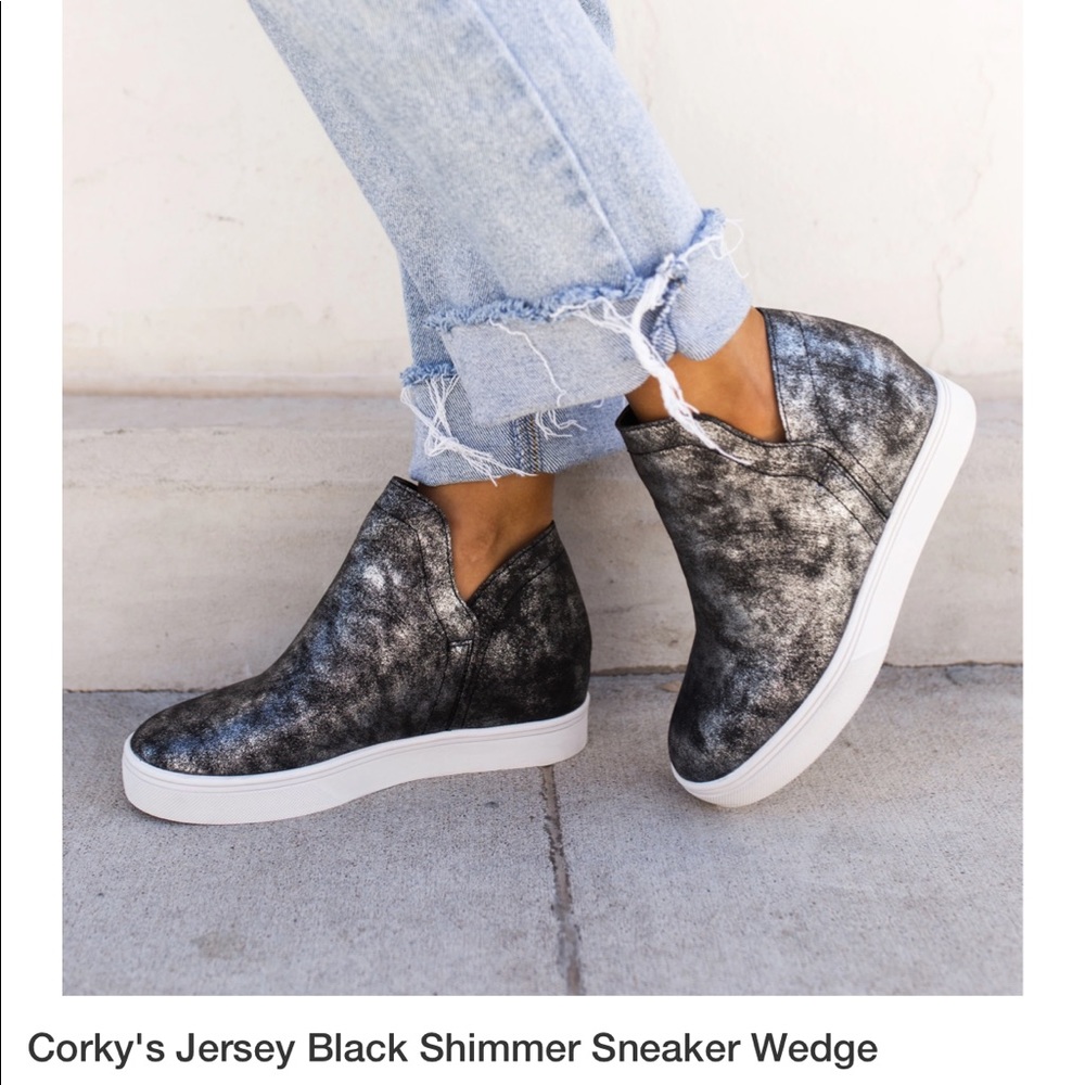 Corky’s black shimmer wedge sneakers